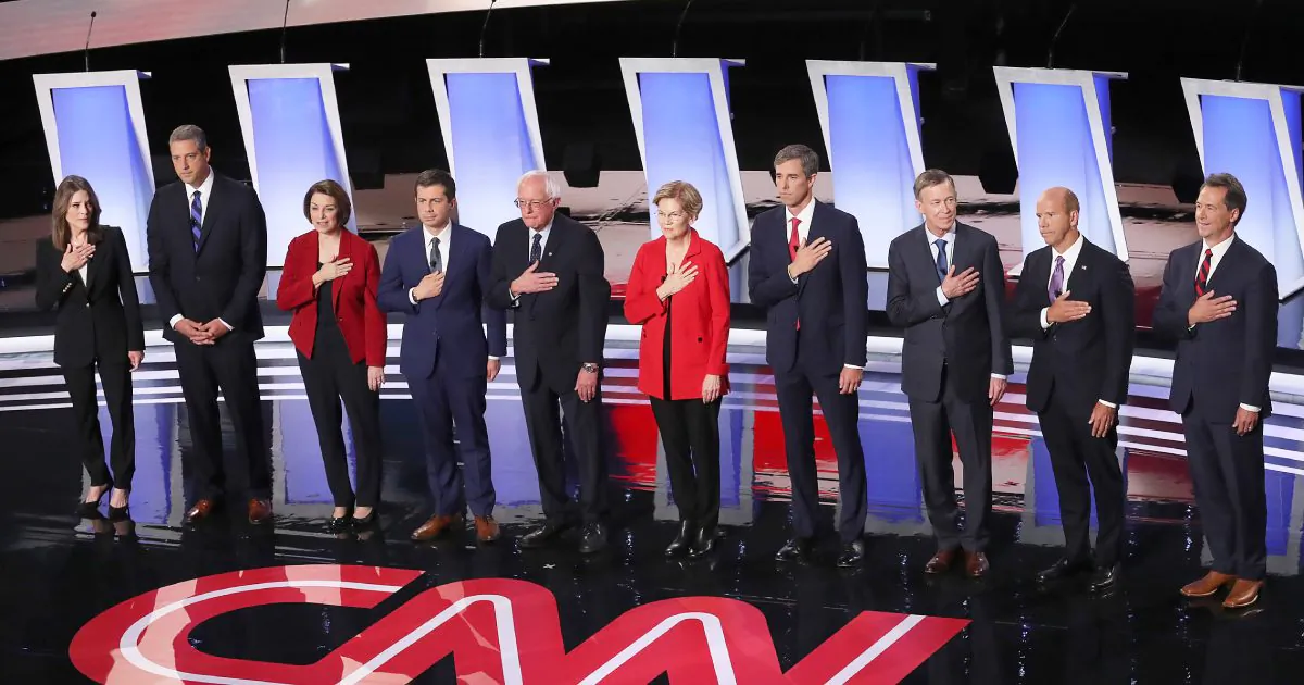 Democratic presidential candidates Marianne Williamson, (L-R), Rep. Tim Ryan (D-OH), Sen. Amy Klobuchar (D-MN), Indiana Mayor Pete Buttigieg, Sen. Bernie Sanders (I-VT), Sen. Elizabeth Warren (D-MA), former Texas congressman Beto O'Rourke, former Colorado governor John Hickenlooper, former Maryland congressman John Delaney, and Montana Gov. Steve Bullock take the stage at the beginning of the Democratic Presidential Debate at the Fox Theatre July 30, 2019, in Detroit, Michigan.  (Justin Sullivan/Getty Images)