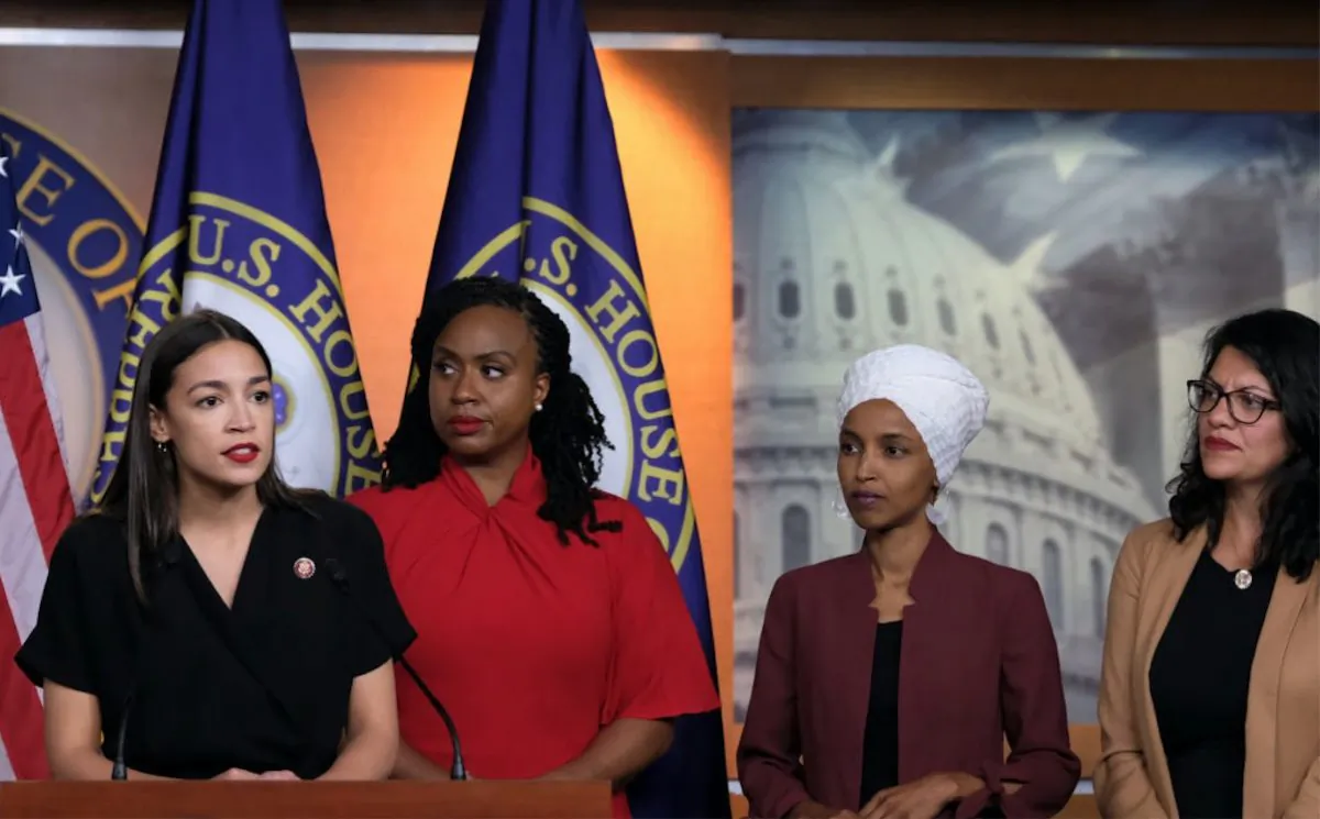 U.S. Rep. Alexandria Ocasio-Cortez (D-NY) speaks as Reps. Ayanna Pressley (D-MA), Ilhan Omar (D-MN), and Rashida Tlaib (D-MI) listen during a press conference in Washington, DC, on July 15, 2019. (Alex Wroblewski/Getty Images)
