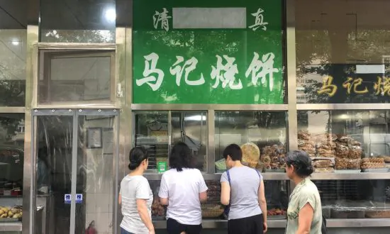 Beijing Orders Arabic, Muslim Symbols Taken Down