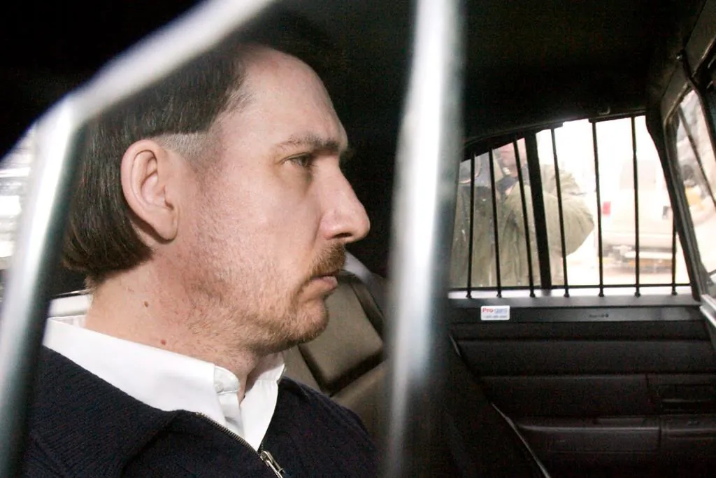 Convicted murderer Curtis Dagenais is escorted from court following sentencing in his murder trial on March 13, 2009 in Saskatoon, SK. (Geoff Howe/The Canadian Press)