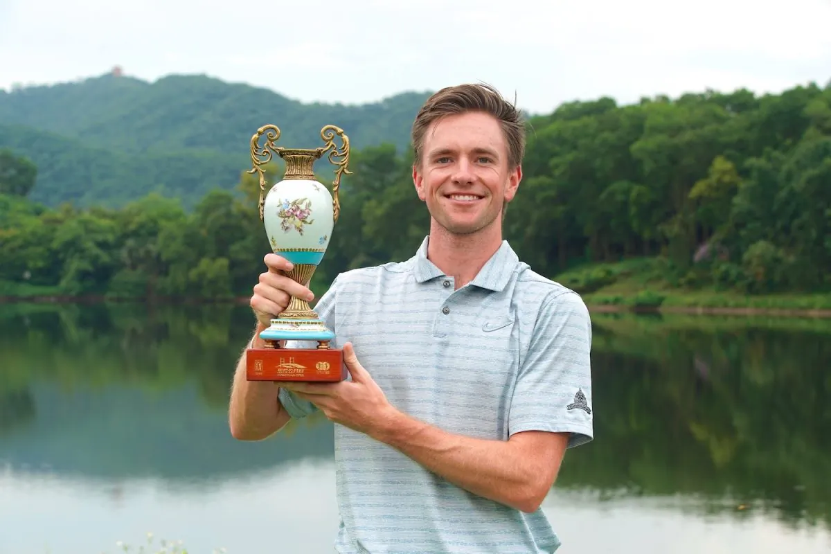 American Joey Lane displays the Donggan Open Trophy after his ten under par win at Mission Hills Norman Course last Sunday July 28. (PGA TOUR Series-China / Zhuang Liu)