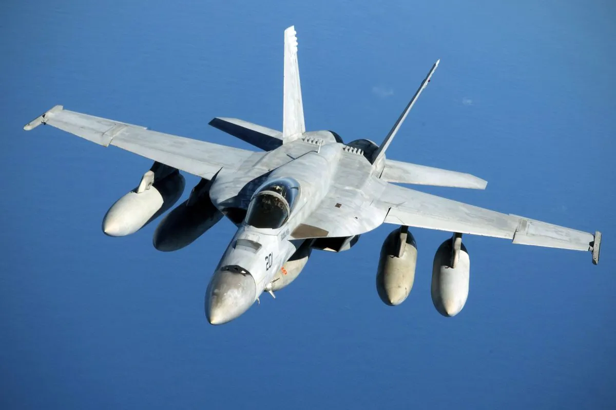 A Navy F/A-18 Super Hornet in flight after refueling over the Pacific Ocean near the coast of Brisbane, Australia on July 17, 2019. (Senior Airman Elora J. Martinez/U.S. Air Force via AP)