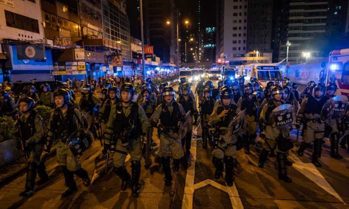 Riot police charge outside of the Mongkok Police Station during a standoff with protesters after an anti-government rally in  Hong Kong, on Sept. 1, 2019. (Anthony Kwan/Getty Images)