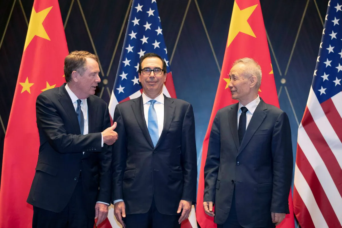 U.S. Trade Representative Robert Lighthizer gestures towards Treasury Secretary Steven Mnuchin as he chats with Chinese Vice Premier Liu He before they pose for a family photo at the Xijiao Conference Center in Shanghai, China, July 31, 2019. (Ng Han Guan/Pool via Reuters)