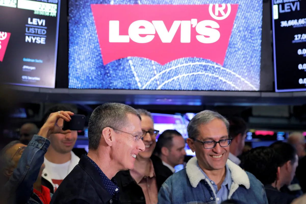 Levi Strauss & Co. CEO Chip Bergh (L) and CFO Harmit Singh (R) attend the company's IPO on the floor of the New York Stock Exchange (NYSE) in New York, on March 21, 2019. (Lucas Jackson/Reuters)