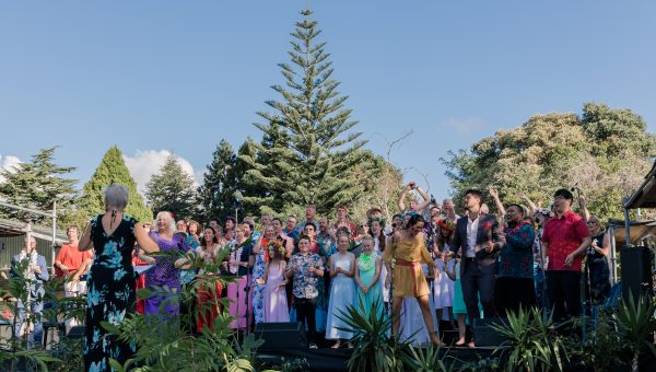 Singers on stage outside