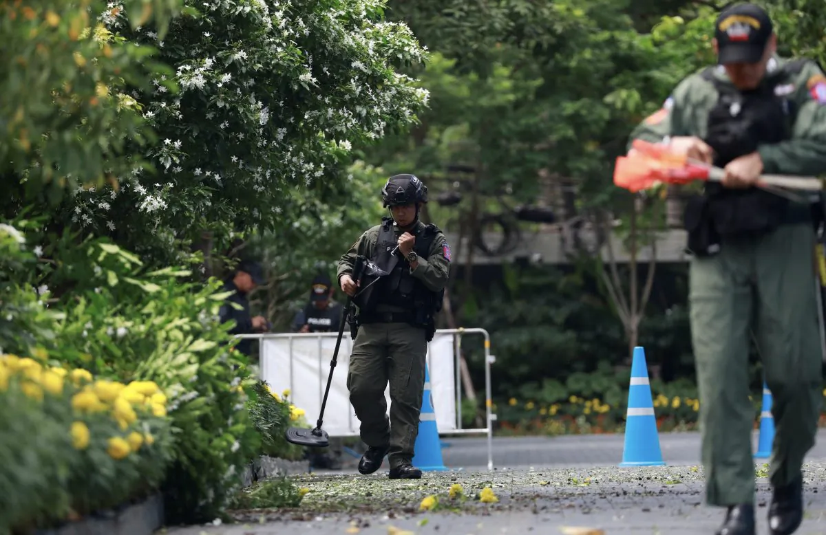 Police Explosive Ordnance Disposal officers work following a small explosion at a site in Bangkok, Thailand, Aug. 2, 2019. (Soe Zeya Tun/Reuters)