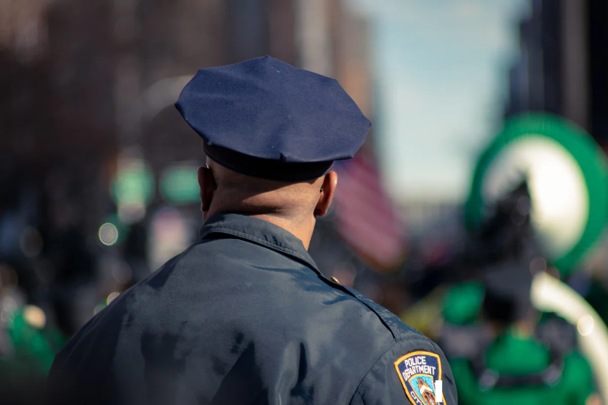 Man wearing police uniform. (Fred Mouniguet Unsplash)