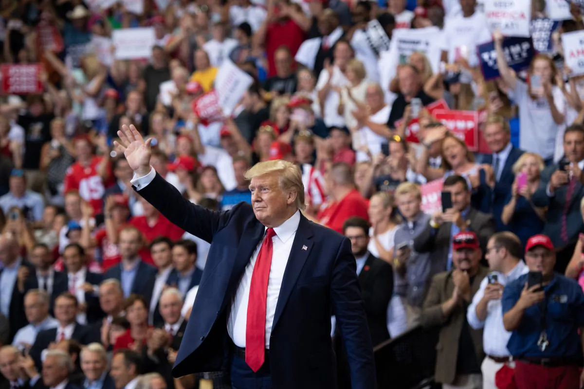 President Donald Trump waves as he arrives to a "Make America Great Again" campaign rally in Cincinnati, Ohio, on Aug. 1, 2019. (Saul Loeb/AFP/Getty Images)