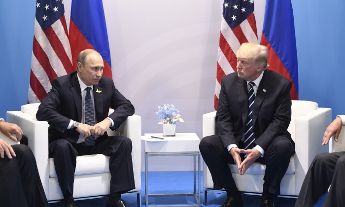 President Donald Trump and Russia's President Vladimir Putin hold a meeting on the sidelines of the G20 Summit in Hamburg, Germany, on July 7, 2017. (SAUL LOEB/AFP/Getty Images)