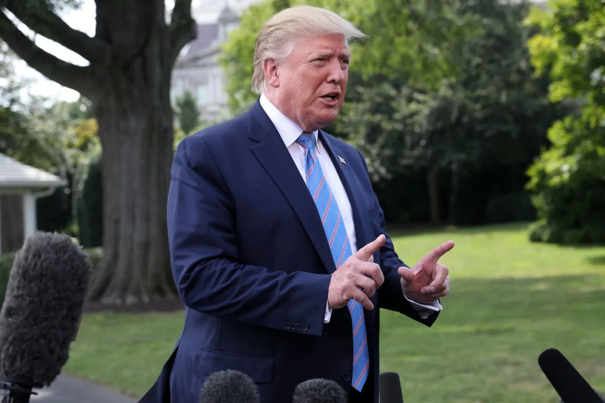 President Donald Trump talks to reporters as he departs for travel to Bedminster, New Jersey from the South Lawn of the White House in Washington, U.S., August 2, 2019. (Reuters/Leah Millis)