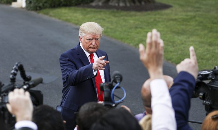 President Donald Trump speaks to the media before boarding Marine One en route to Ohio on the White House South Lawn in Washington on Aug. 1, 2019. (Charlotte Cuthbertson/The Epoch Times)