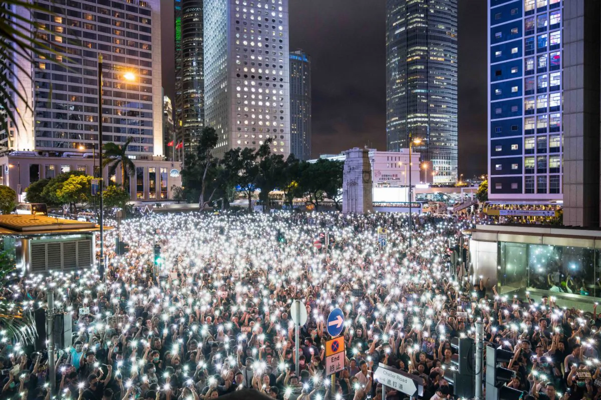 Demonstrators gather and illuminated smartphone flashlights during a rally organised by civil servants at Chater Garden in the Central district in Hong Kong, on Aug. 02, 2019. (Billy H.C. Kwok/Getty Images)
