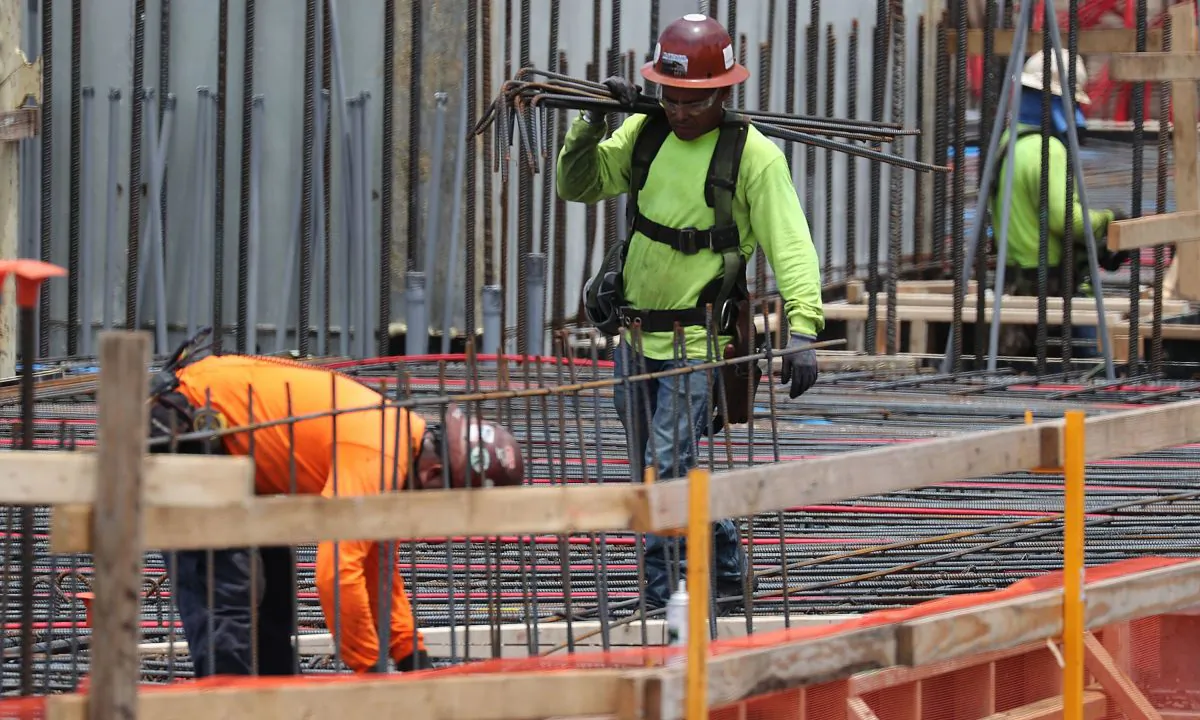 Construction workers are pictured in Fort Lauderdale, Fla., on May 3, 2019. (Joe Raedle/Getty Images)