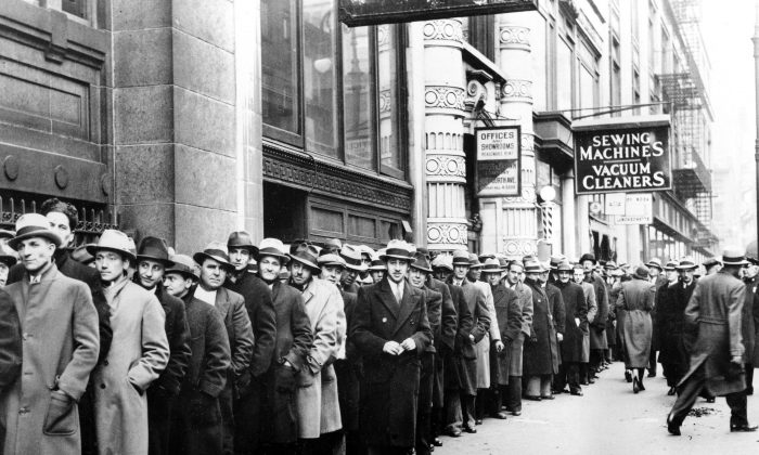 Unemployed people line up outside the State Labor Bureau in New York during the Great Depression on Nov. 24, 1933. Following the crisis, Western society was deeply influenced by the theories of Keynesian economics, which advocates active state intervention and regulation of the economy by using finance. (AP Photo)