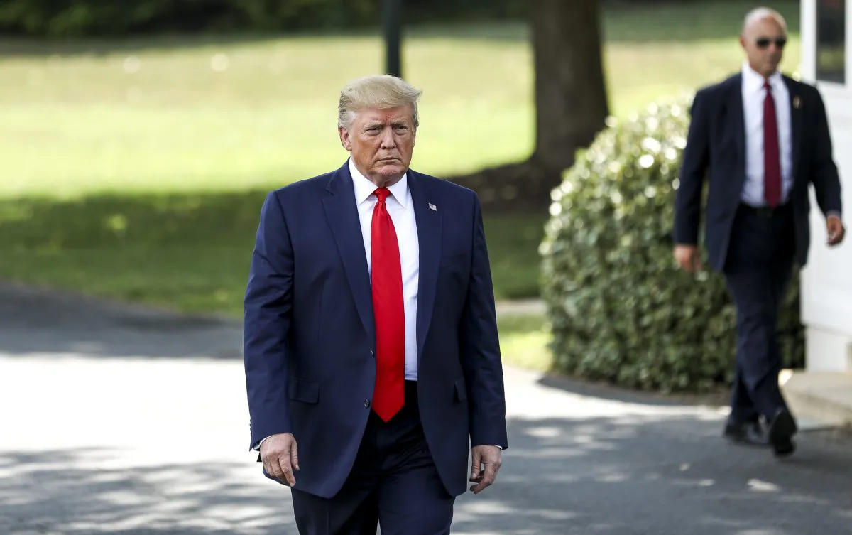 President Donald Trump speaks to the media before boarding Marine One en route to Ohio on the White House South Lawn in Washington on Aug. 1, 2019. (Charlotte Cuthbertson/The Epoch Times)