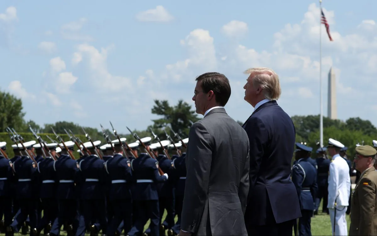 President Donald Trump (R) and Secretary of Defense Dr. Mark Esper (L) inspect the troops during a full honors welcome ceremony on the parade grounds at the Pentagon, on July 25, 2019 in Arlington, Virginia.(Mark Wilson/Getty Images)