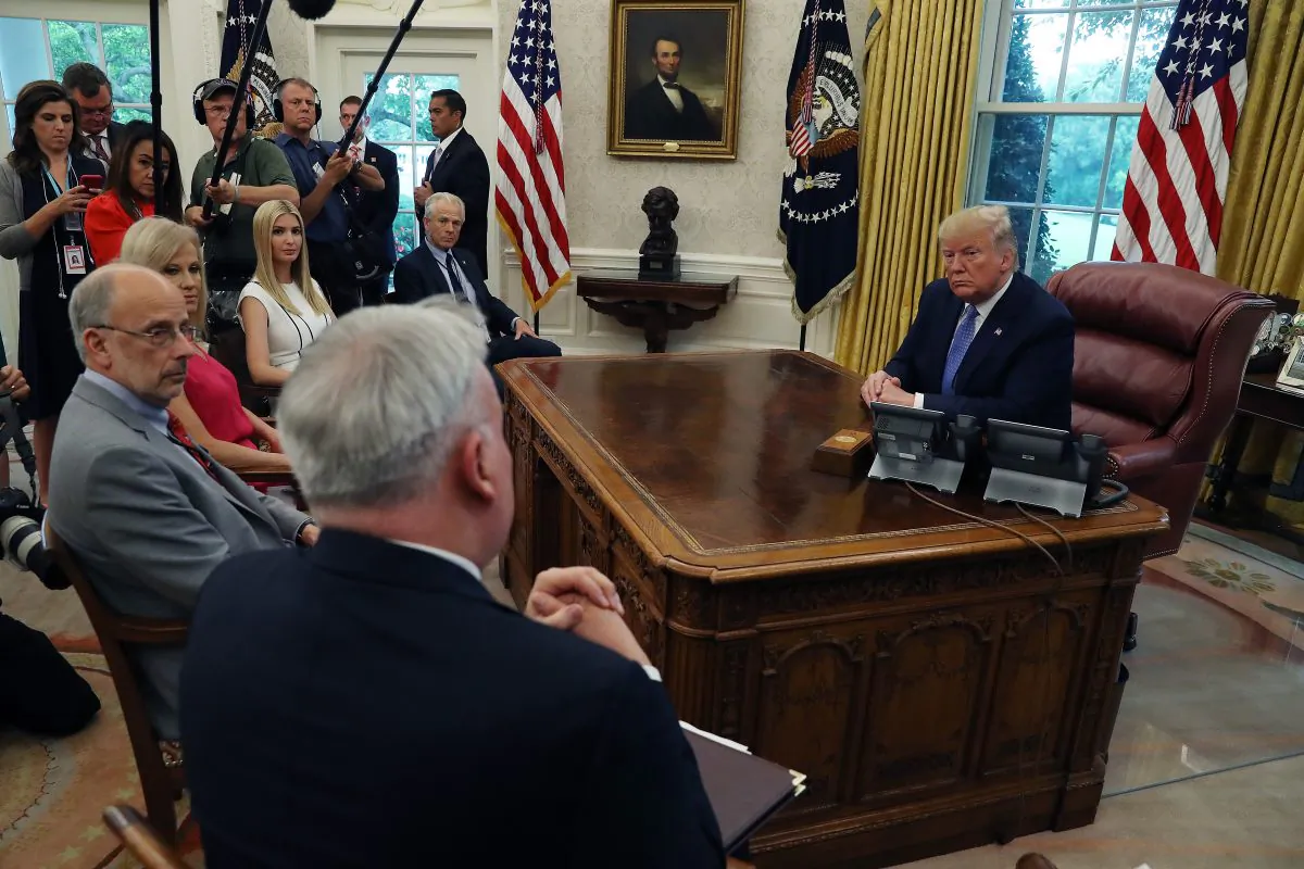 U.S. President Donald Trump listens as he gets an update from administration officials on the Fentanyl epidemic, in the Oval Office at the White House on June 25, 2019 in Washington, DC. (Mark Wilson/Getty Images)