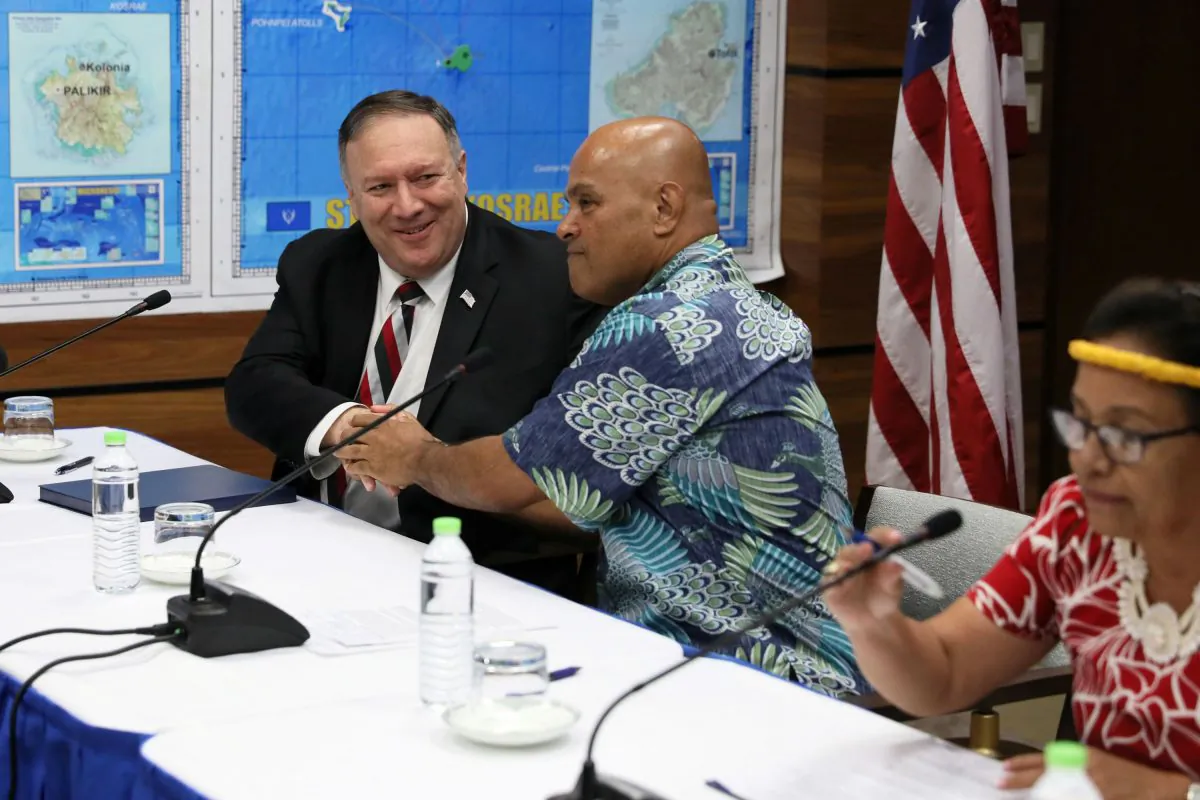 U.S. Secretary of State Mike Pompeo (L), Federated States of Micronesia President David Panuelo, and Marshall Islands President Hilda Heine (R) hold a news conference after their meetings in Kolonia, Federated States of Micronesia, on Aug. 5, 2019. (Jonathan Ernst/Reuters)