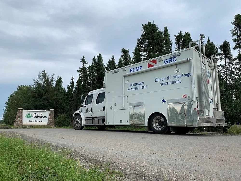 Manitoba RCMP's Underwater Recovery Team (URT) is seen in this police image published to social media on August 3, 2019. Divers will begin to search a section of the Nelson River which is northeast of Gillam, MB, August 4. (HO-Twitter, RCMP @rcmpmb/The Canadian Press)