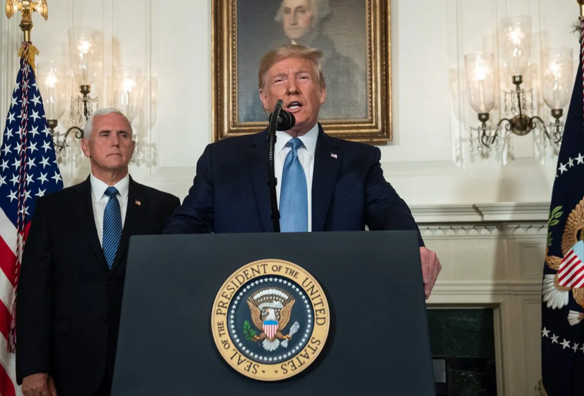 President Donald Trump speaks alongside Vice President Mike Pence about the mass shootings from the Diplomatic Reception Room of the White House in Washington on Aug. 5, 2019. (SAUL LOEB/AFP/Getty Images)