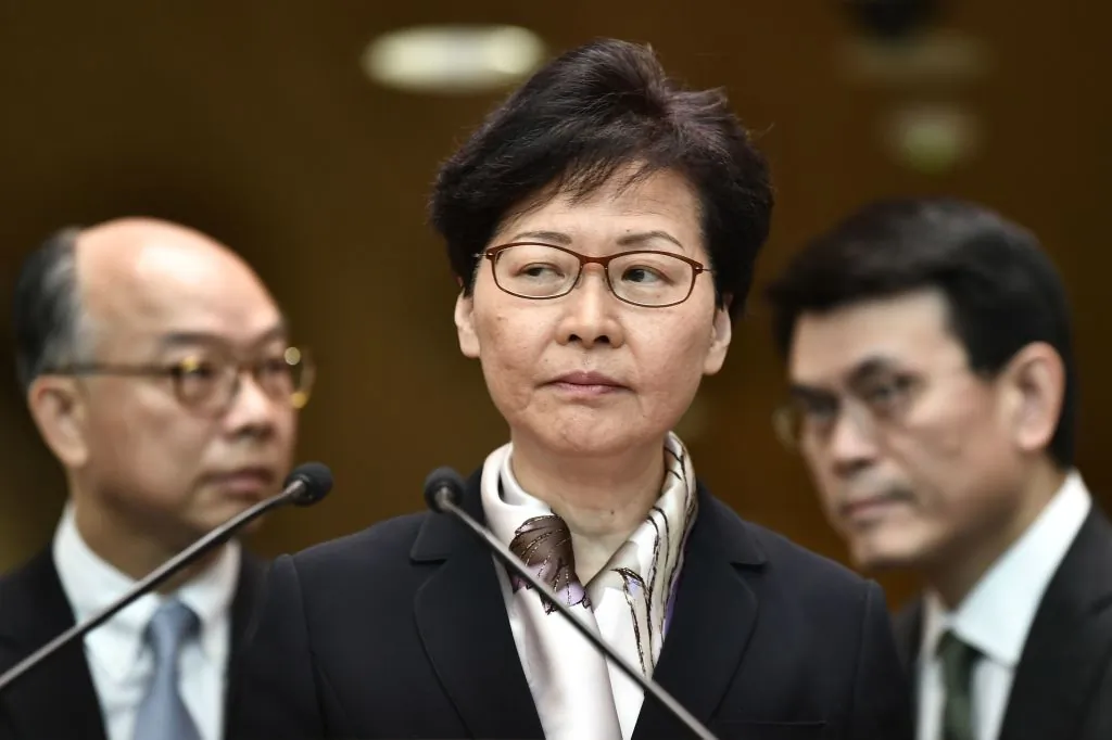Hong Kong leader Carrie Lam (C) attends a press conference in Hong Kong on Aug. 5, 2019. (Anthony Wallace/AFP/Getty Images)
