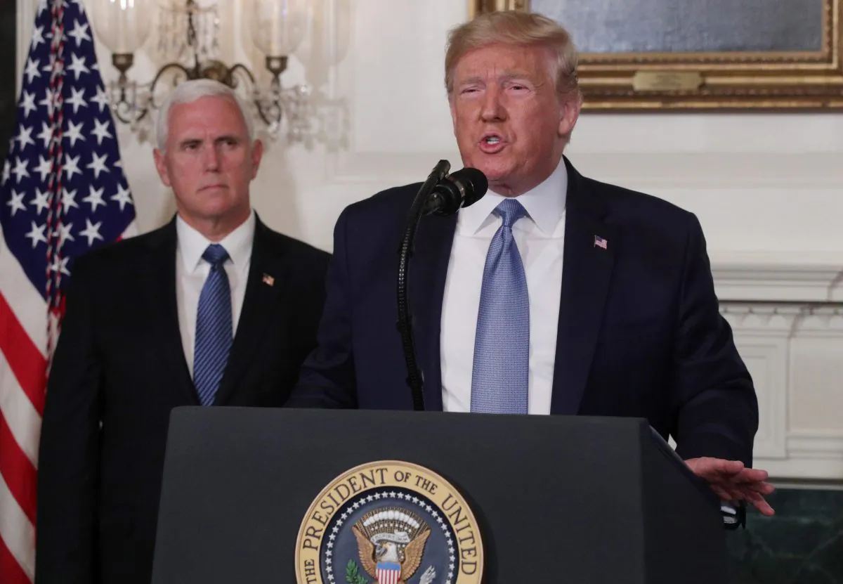 President Donald Trump makes remarks in the Diplomatic Reception Room of the White House as U.S. Vice President Mike Pence looks on on Aug. 5, 2019. (Alex Wong/Getty Images)
