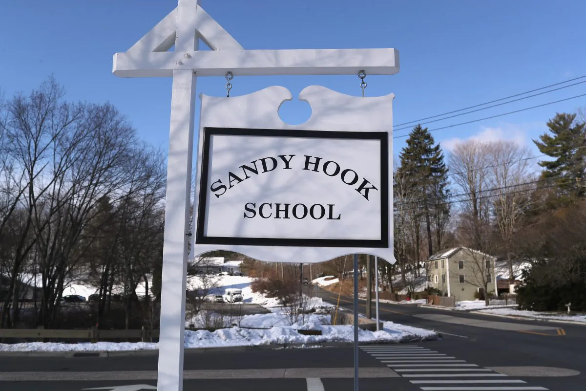 A sign stands near the site of the December 2012 Sandy Hook school shooting in Sandy Hook Connecticut, on March 14, 2018. (John Moore/Getty Images)