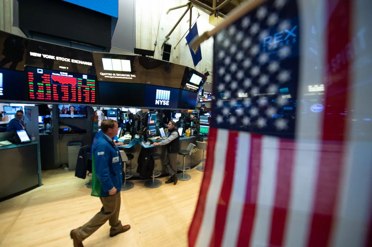 Traders on the floor at the closing bell of the Dow Industrial Average at the New York Stock Exchange in New York on June 25, 2018. (Bryan R. Smith/AFP/Getty Images)