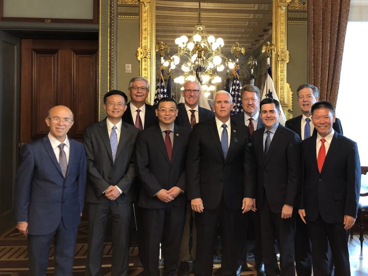 Front row (from L):  Director of Uyghur Human Rights Project Omer Kanat; Washington Falun Dafa Association VP of Advocacy Jeff Chen; founder of Citizen Power Initiatives for China Dr. Yang Jianli; Vice President Mike Pence; founder of China Aid Bob Fu (first right). Back row (from L): Randal Everett, president of 21st Century Wilberforce Initiative; David Curry, CEO of Open Doors USA; Greg Mitchell, co-president of International Religious Freedom Roundtable; U.S. Ambassador-at-Large for International Religious Freedom Samuel D. Brownback.  (Courtesy Yang Jianli)