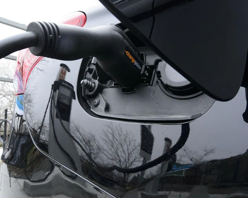 A car is charged at a charge station for electric vehicles on Parliament Hill in Ottawa on May 1, 2019. (Sean Kilpatrick/The Canadian Press)