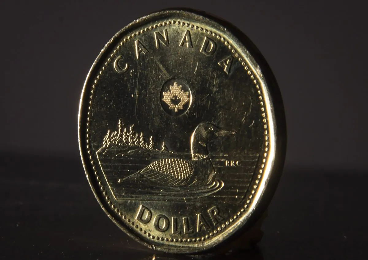 The Canadian dollar coin is pictured on May 29, 2019. (The Canadian Press/Jonathan Hayward)