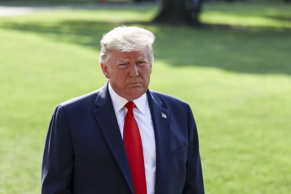 President Donald Trump speaks to media before departing on Marine One en route to Ohio and Texas, from the White House South Lawn in Washington on Aug. 7, 2019. (Charlotte Cuthbertson/The Epoch Times)