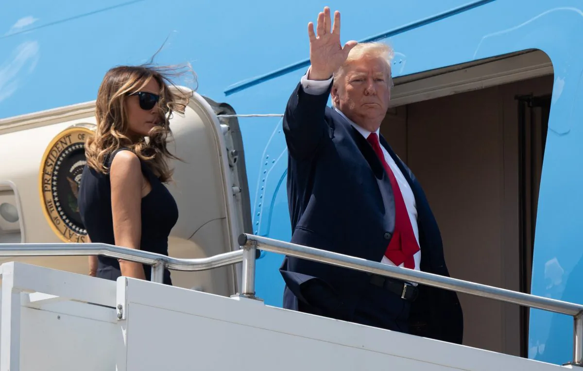 President Donald Trump and First Lady Melania Trump board Air Force One at Wright-Patterson Air Force Base on August 7, 2019, in Ohio. (Saul Loeb/AFP/Getty Images)