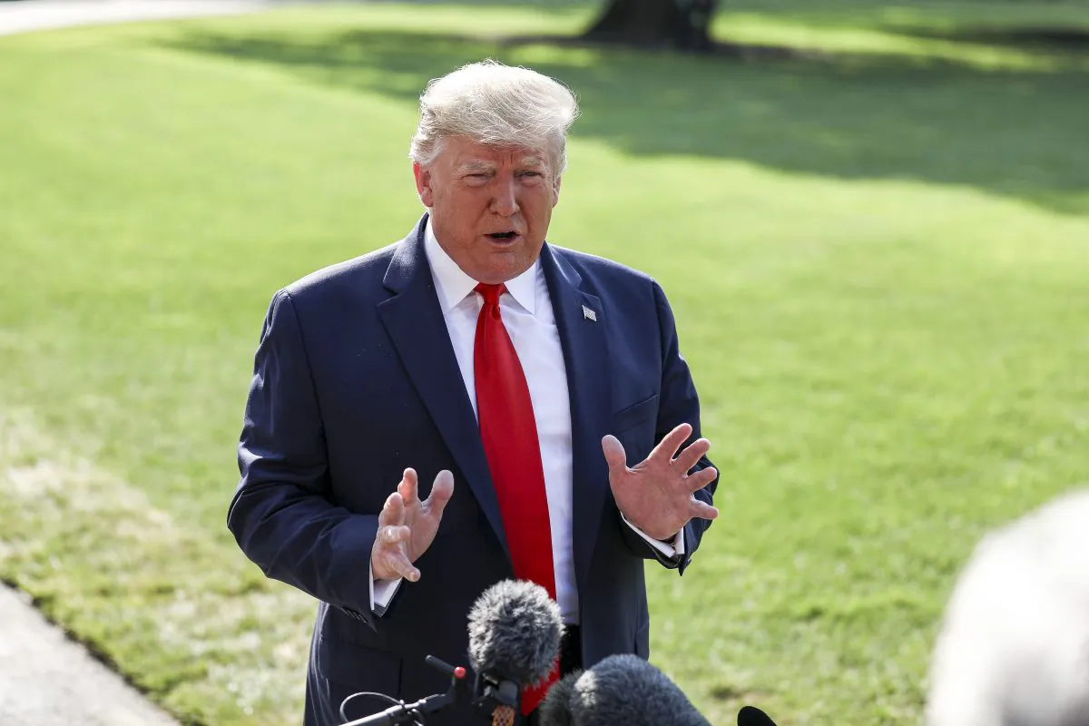 President Donald Trump speaks to media before departing on Marine One en route to Ohio and Texas, from the White House South Lawn in Washington on Aug. 7, 2019. (Charlotte Cuthbertson/The Epoch Times)