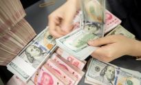 Beijing Sets Currency to Weakest Level Since 2008 as Trade War Deepens