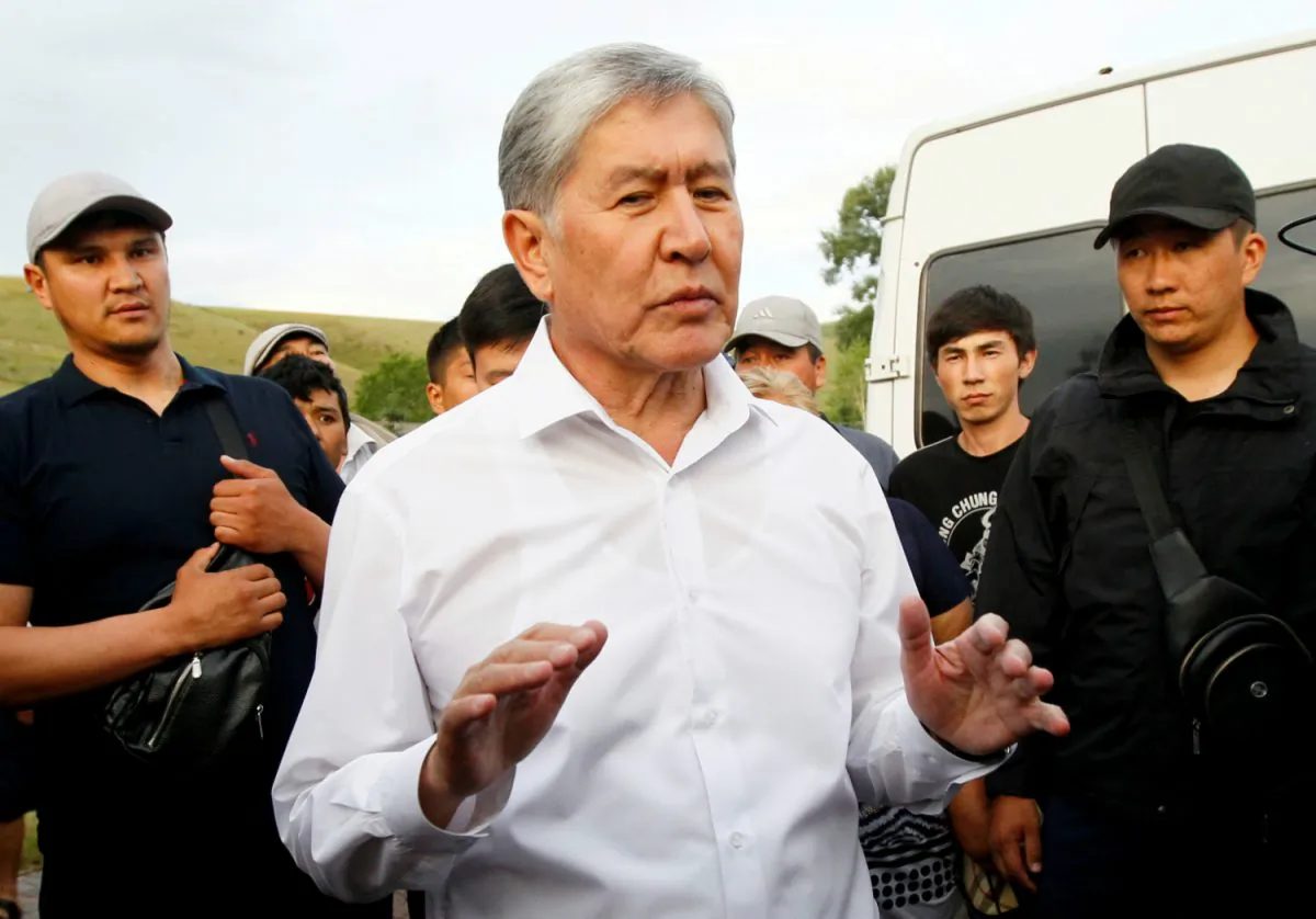 Kyrgyz former President Almazbek Atambayev, who was stripped of legal immunity after a parliamentary vote, and his supporters attend a meeting with journalists in the village of Koy-Tash near Bishkek, Kyrgyzstan, on June 27, 2019. (Vladimir Pirogov/Reuters)