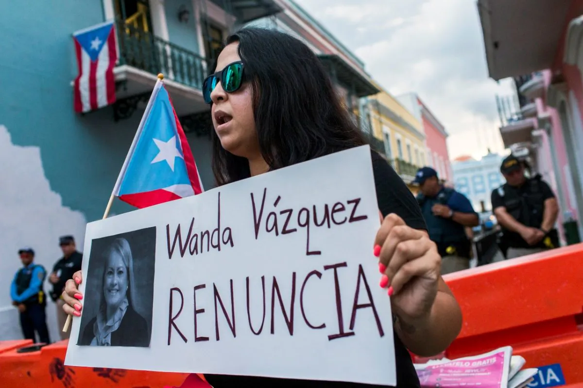 Protesters gather outside the government mansion La Fortaleza calling for the removal of the island's newly sworn-in governor in San Juan, Puerto Rico, on Aug. 7, 2019. (Dennis M. Rivera Pichardo/AP Photo)