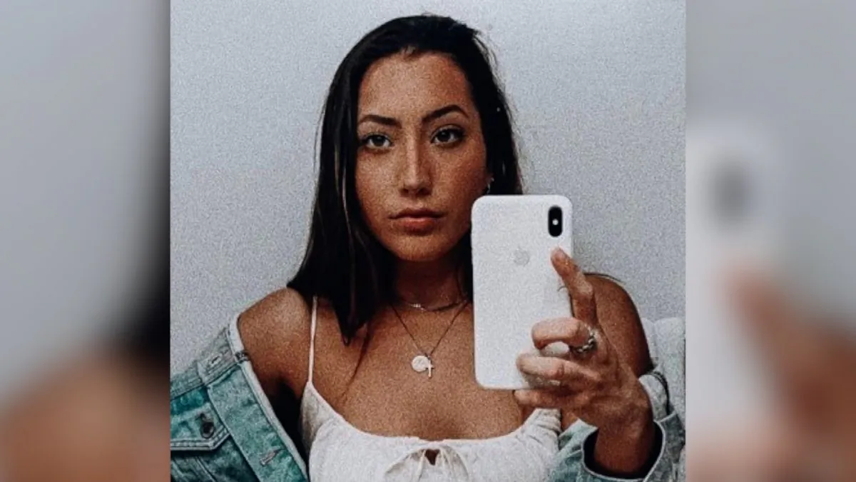 YouTube star Brooke Houts is the subject of a police investigation over a video that appears to show her abusing her Doberman. (@brookehouts/Twitter via CNN)