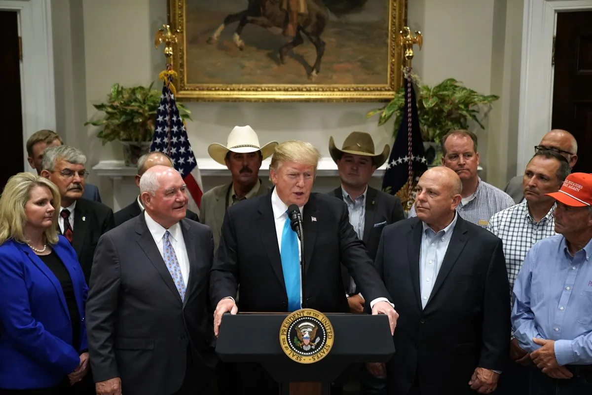 President Donald Trump delivers remarks in support of farmers and ranchers with Agriculture Secretary Sonny Perdue (3rd L) in the Roosevelt Room at the White House in Washington on May 23, 2019. (Chip Somodevilla/Getty Images)
