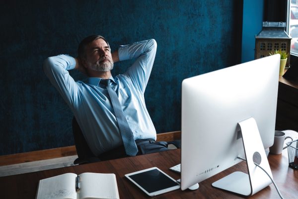 Focused mature businessman deep in thought