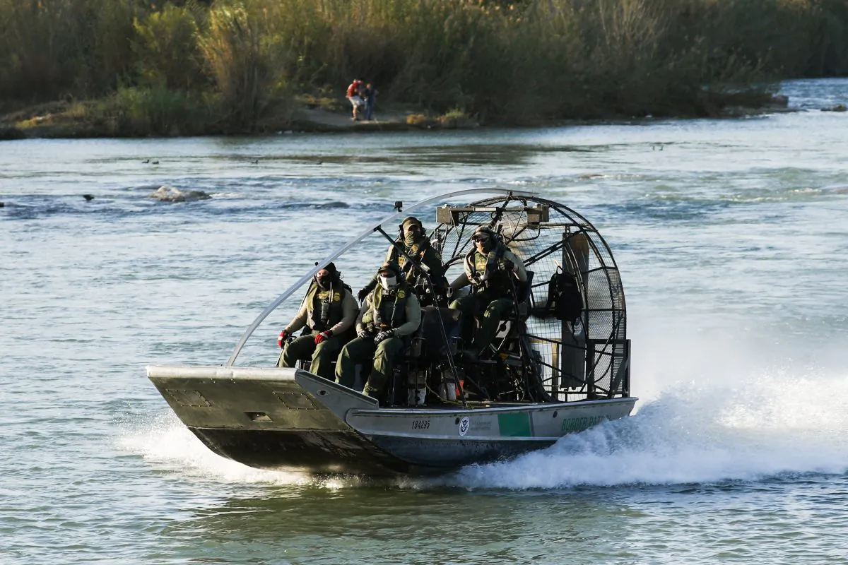 A U.S. Customs and Border Protection boat patrols the Rio Grande at Eagle Pass, Texas, on Feb. 16, 2019. (Charlotte Cuthbertson/The Epoch Times)