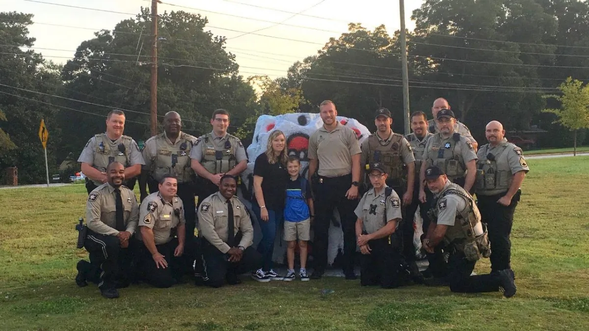 Sheriff's deputies escorted 9-year-old Caden Dixon to his first day of class in Gainesville, Ga., on Aug. 7, 2019. (Hall County Sheriff's Office)
