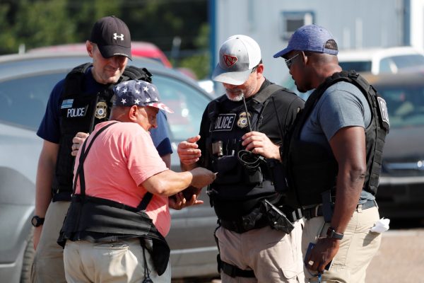 police check documents of worker