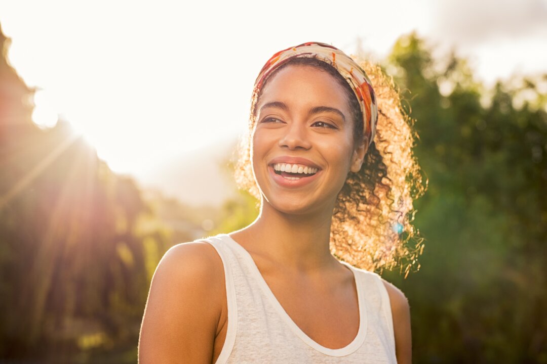 Happiness can be hard to come by, but researchers hope to provide meaningful things people can do to increase their positive emotions. (Rido/Shutterstock)
