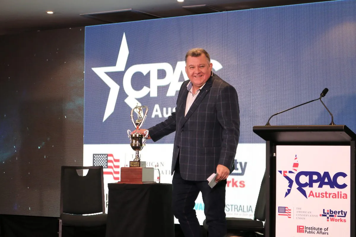 Australian center-right Liberal MP Craig Kelly unveils the 'CPAC Freedom Award' at the first Conservative Political Action Conference (CPAC) Australia on Aug. 10, 2019. (The Epoch Times)