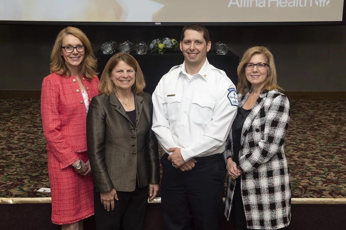 Ivan Mazurkiewicz (2nd L) at the Allina Health Commitment to Care Awards ceremony. (Courtesy of Allina Health)
