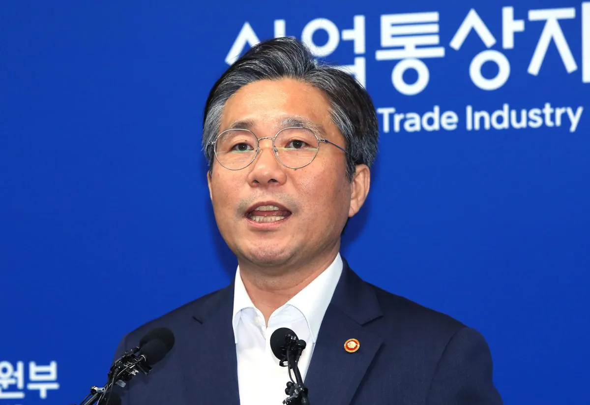 South Korean Trade Minister Sung Yun-mo speaks during a press conference at the government complex in Sejong, South Korea, on Aug. 12, 2019. (Jin Sung-chul/Yonhap via AP)