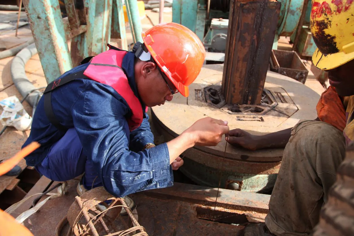 A technician with a Chinese company works at the construction site of a bridge at Kurasini area in Dar es Salaam, Tanzania, on March 23, 2013. (John Lukuwi/AFP/Getty Images)