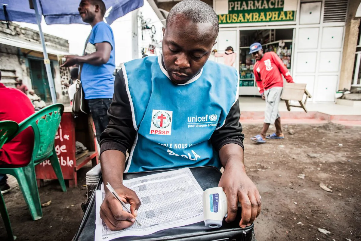 A health worker registers temperatures of people checked in Goma, Democratic Republic of Congo, on July 31, 2019. (Pamela Tulizo/AFP/Getty Images)